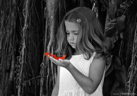 girl looking at red cloth